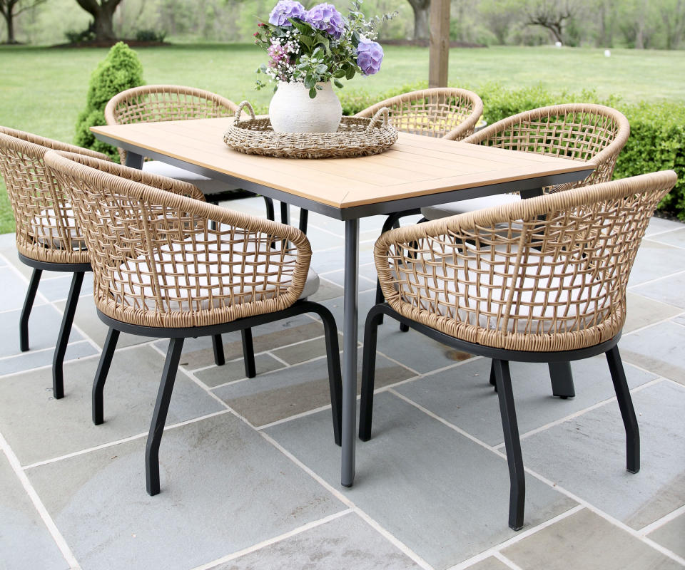 patio with bluestone pavers and dining set