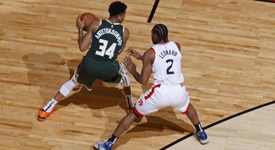 Milwaukee's Giannis Antetokounmpo handles the ball against Toronto's Kawhi Leonard during Eastern Conference Finals action at Scotiabank Arena. (Photo by Mark Blinch/NBAE via Getty Images)