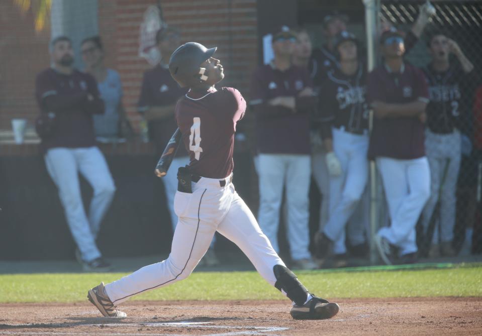 Benedictine's Justin Thomas connects for a hit during a recent home game.