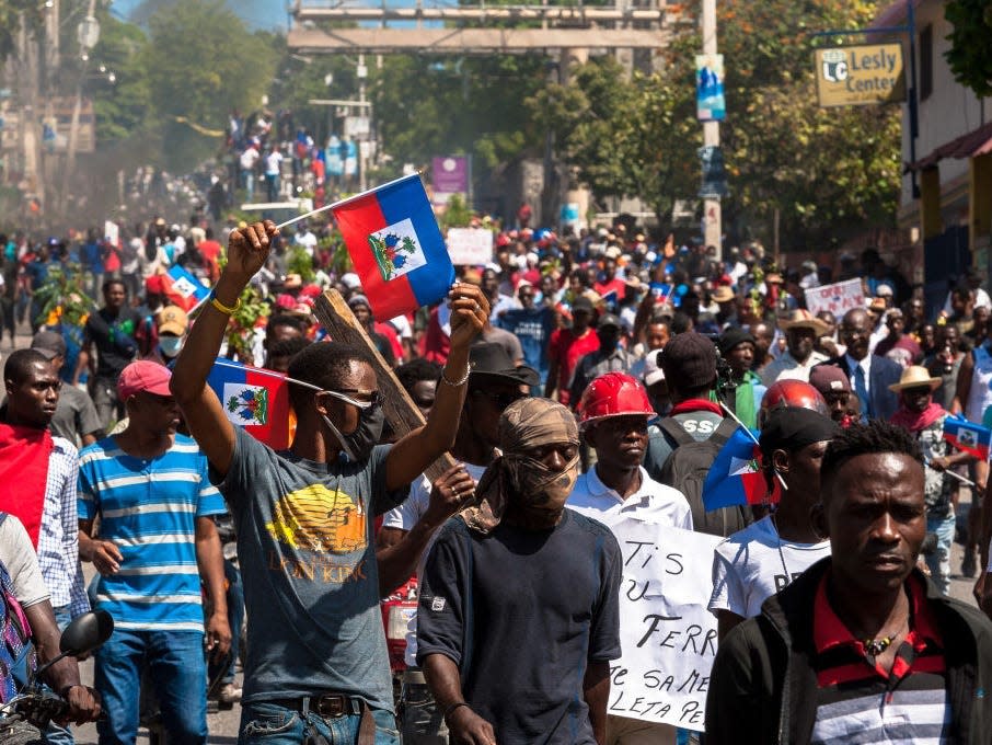 Haitians in the streets during a protest.