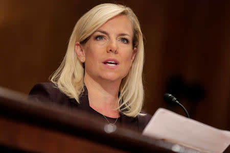 FILE PHOTO: Kirstjen Nielsen testifies to the Senate Homeland Security and Governmental Affairs Committee on her nomination to be secretary of the Department of Homeland Security (DHS) in Washington, U.S., November 8, 2017. REUTERS/Joshua Roberts