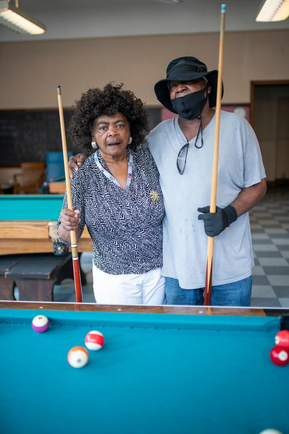Florence Jones, 70, of Detroit, left, says the secret to a long and happy life is "no smoking, no drinkin'," her pool partner Alandis Long, 66, of Detroit, said 'know God' as they play some pool at St. Patrick Senior Center Inc. in Detroit on July 26, 2023. The Free Press asked seniors to reflect on what the secrets are to living a long and happy life.