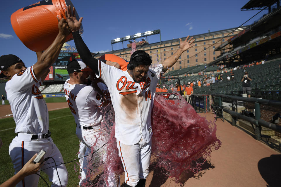 Baltimore Orioles' Rio Ruiz is doused after a baseball game against the Houston Astros, Sunday, Aug. 11, 2019, in Baltimore. Ruiz hit a two-run walkout home run. The Orioles won 8-7. (AP Photo/Nick Wass)