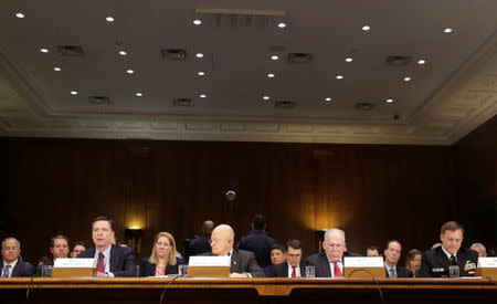 (L-R) FBI Director James Comey, Director of National Intelligence (DNI) James Clapper, CIA Director John Brennan and NSA Director Admiral Michael Rogers testify before the Senate Select Committee on Intelligence hearing on “Russia’s intelligence activities" on Capitol Hill in Washington, U.S. January 10, 2017. REUTERS/Joshua Roberts