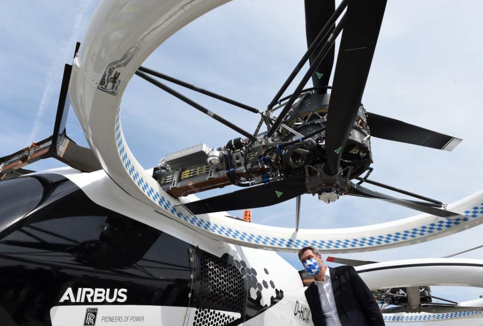 Bavaria's State Premier Markus Soeder looks at an electric helicopter during his visit to the Airbus helicopters production site in Donauwoerth, southern Germany, on July 20, 2020. (AFP via Getty Images)