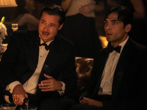 Brad Pitt as Jack Conrad and Diego Calva as Manny Torres in "Babylon."