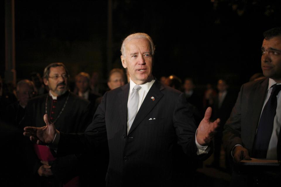 U.S. Vice President Joe Biden speaks to journalists during a visit to the Basilica of Guadalupe in Mexico City, Monday, March 5, 2012. Biden is on a one-day official visit to Mexico. (AP Photo/Alexandre Meneghini)