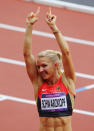 Lilli Schwarzkopf of Germany celebrates after competing in the Women's Heptathlon 100m Hurdles Heat 1 on Day 7 of the London 2012 Olympic Games at Olympic Stadium on August 3, 2012 in London, England. (Photo by Streeter Lecka/Getty Images)