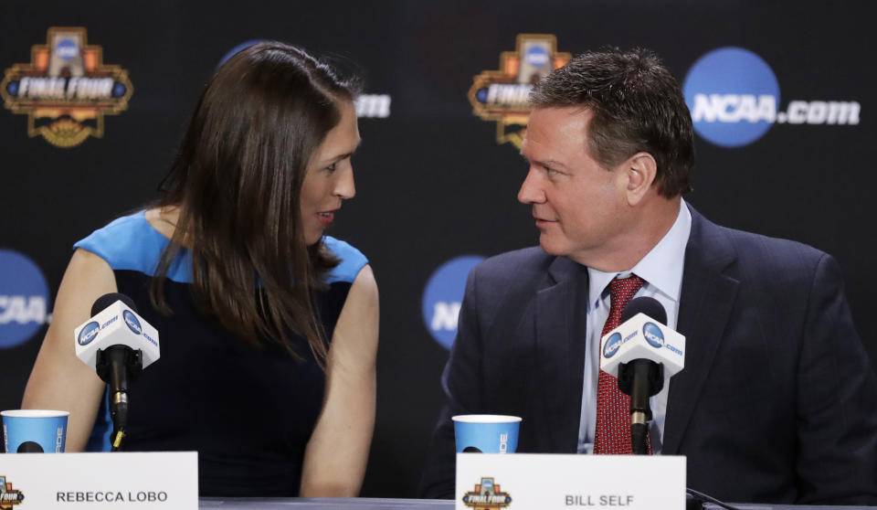 Rebecca Lobo talks to Bill Self at the Basketball Hall of Fame news conference, Saturday, April 1, 2017, in Glendale, Ariz. (AP Photo/David J. Phillip)