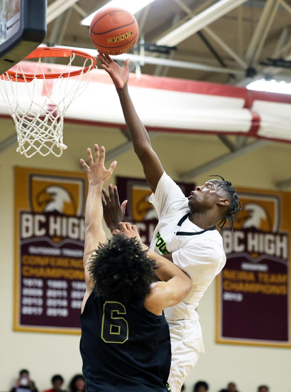 Prolific Prep's AJ Dybantsa scores a basket on Orangeville Prep defender Kaden Stuckey during a game on Wednesday, Jan. 10, 2024.