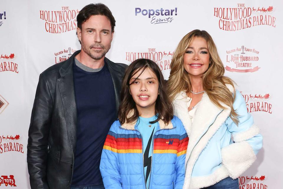 <p>Tommaso Boddi/Getty</p> Denise Richards (R) and husband Aaron Phypers (L) with daughter Eloise 
