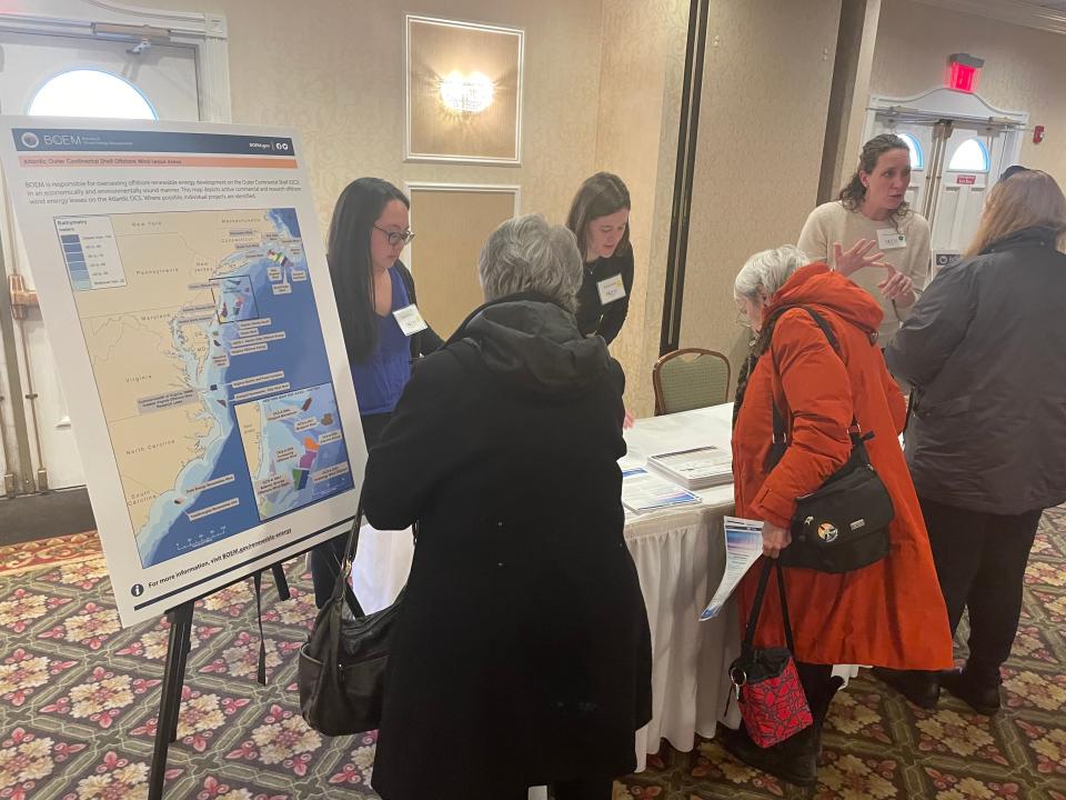 Attendees ask questions about offshore wind projects at a Bureau of Ocean Energy Management meeting at the Clarion Hotel and Conference Center in Toms River on Thursday, Feb. 8, 2024.