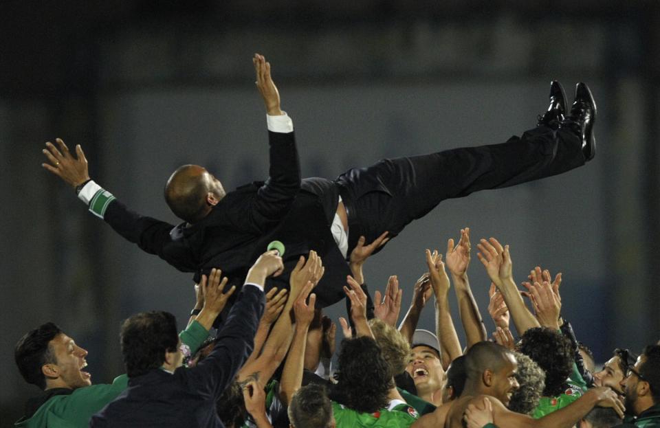 Rio Ave's coach Nuno Espirito Santo is tossed at the end of the Portuguese Cup semifinal second leg football match Rio Ave vs SC Braga at the Arcos stadium in Vila do Conde on April 16, 2014. Rio Ave won 2-0 and is qualified for the final.  AFP PHOTO/ MIGUEL RIOPA        (Photo credit should read MIGUEL RIOPA/AFP via Getty Images)