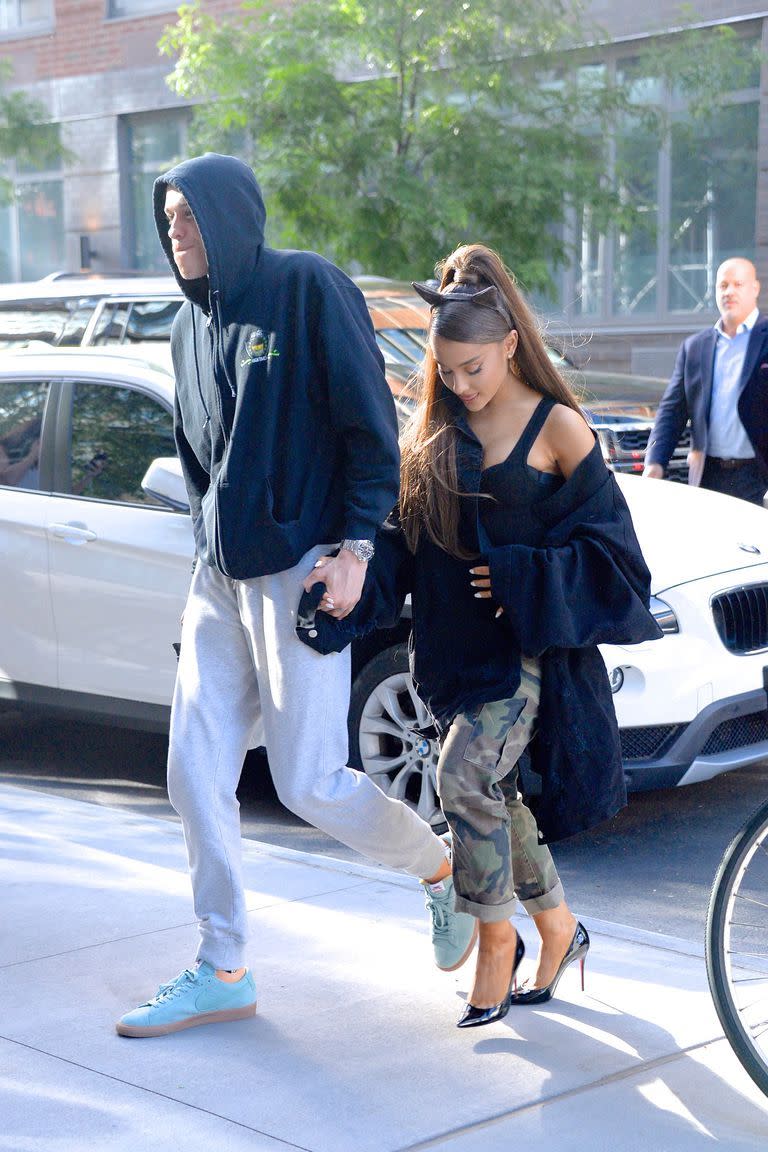 <p>Though she never met him, Ariana got a tattoo in honor of Pete's Davidson's dad shortly after they started dating. </p><p>She had "8148" inked on her foot, the Scott Davidson's firefighter badge number. Pete also has a tattoo of the numbers as a tribute to his father, who died in 9/11. Ari later covered it with "Myron," Mac Miller's dog who she adopted after his death. </p>