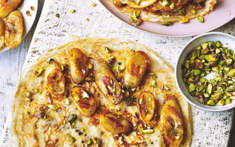 Caramelised banana crêpe with pistachios & honey