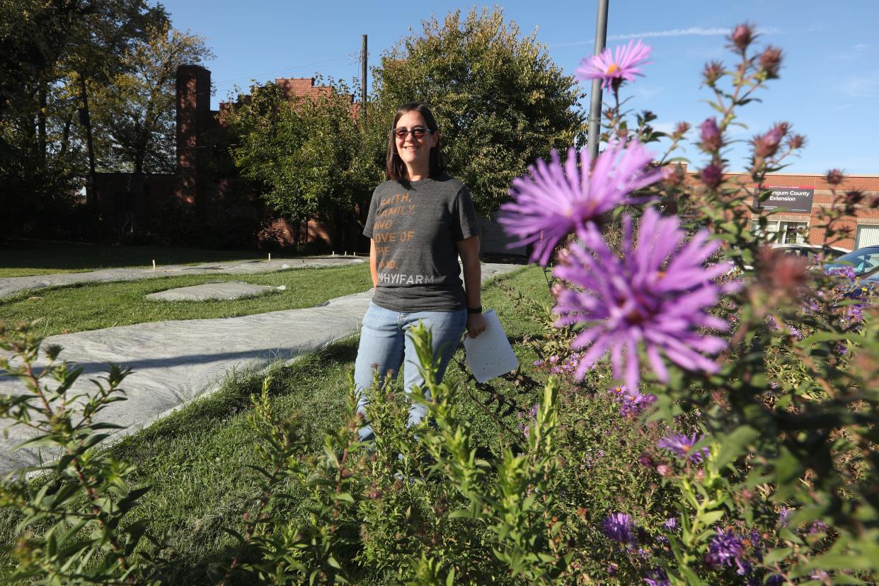 Melissa Devore, an agriculture technician with theÂ Muskingum Soil and Water Conservation District stands near the site where the district's pollinator garden will soon grow native plants.