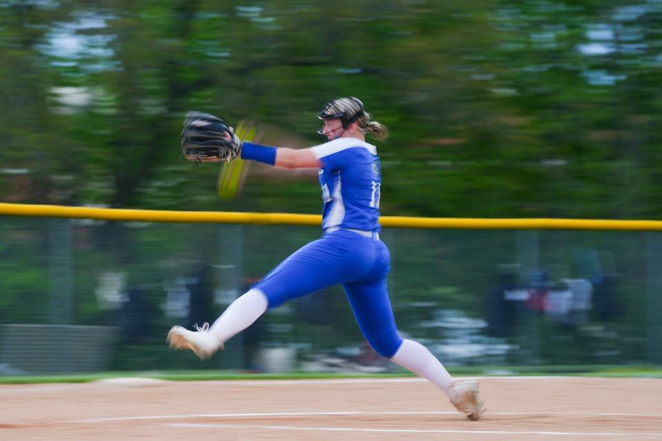 Eastern Hancock Royals McKenna Stewart (11) pitches the ball to a Lapel High School Bulldogs hitter, Friday, May 3, 2024, during the varsity girls softball game at Lapel High School in Lapel, Indiana. The Eastern Hancock Royals defeated the Lapel High School Bulldogs 2-1.