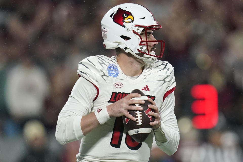 Louisville quarterback Jack Plummer looks for a receiver during the first half of the team's Atlantic Coast Conference championship NCAA college football game against Florida State, Saturday, Dec. 2, 2023, in Charlotte, N.C. (AP Photo/Erik Verduzco)