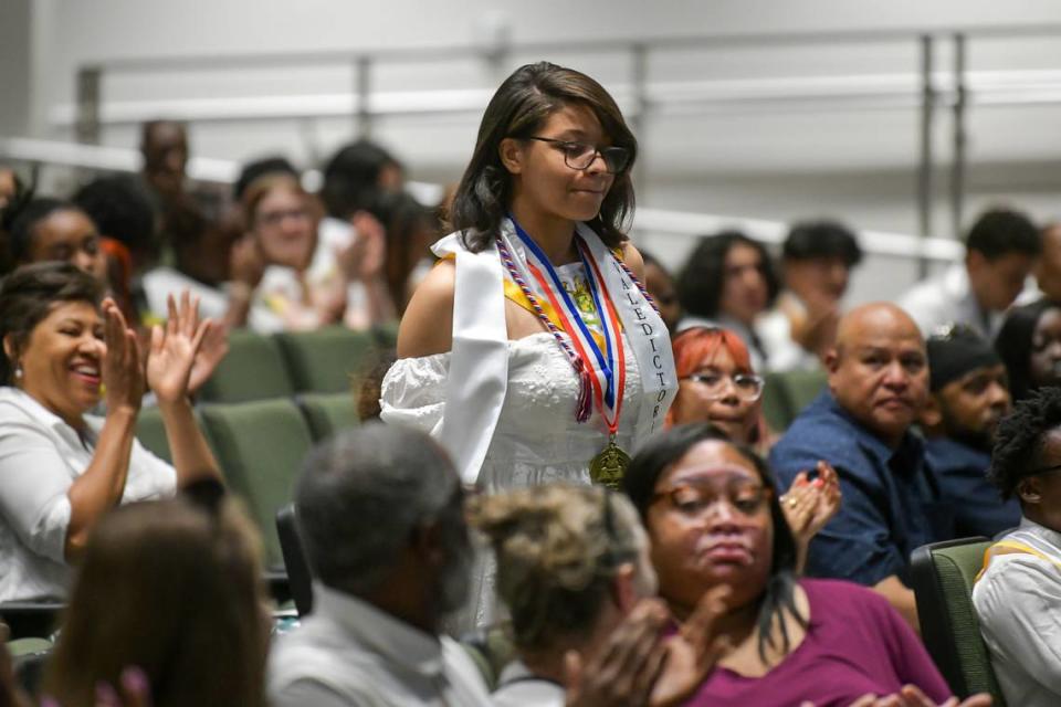 Spencer High School senior Jada Brown reacts after she was announced as one of the Charleen Brown Robinson Scholarship recipients during the senior class awards ceremony May 8, 2024, in the Spencer auditorium.