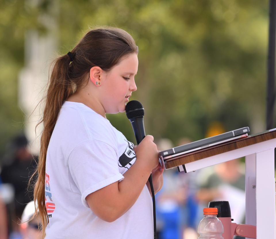 Eight-year-old Addisyn Mayer was one of the speakers. Hundreds showed up at the West Melbourne Community Park Saturday for the March for Our Lives protest against gun violence.