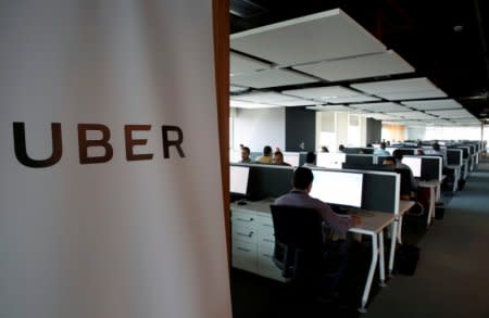 FILE PHOTO: Employees work inside Uber's Centre of Excellence office in Cairo, Egypt October 10, 2017. REUTERS/Amr Abdallah Dalsh/File Photo