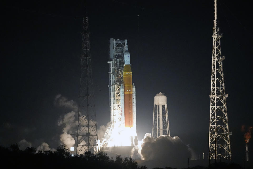 NASA's new moon rocket lifts off from Launch Pad 39B at the Kennedy Space Center in Cape Canaveral, Fla., Wednesday, Nov. 16, 2022. This launch is the first flight test of the Artemis program. (AP Photo/John Raoux)