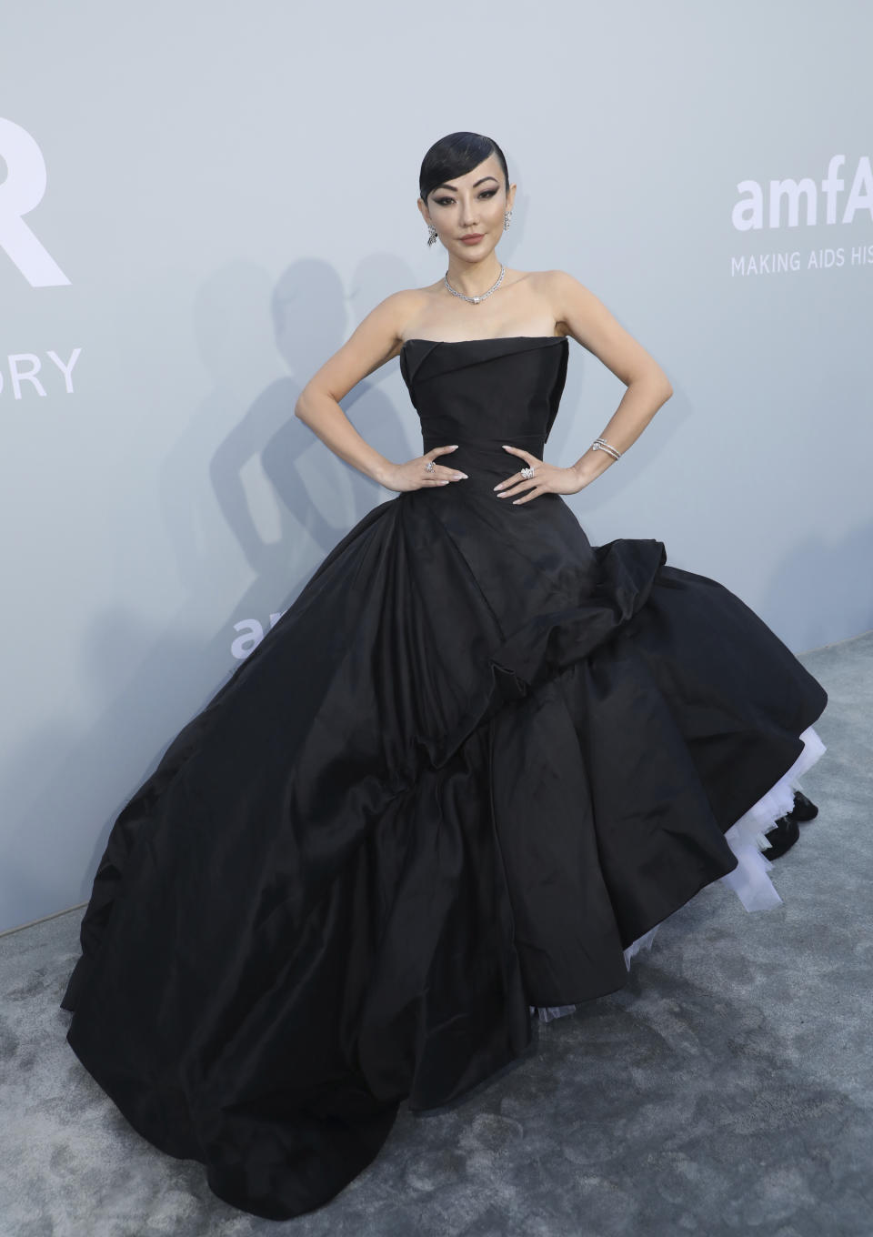 Jessica Wang poses for photographers upon arrival at the amfAR Cinema Against AIDS benefit the during the 74th Cannes international film festival, Cap d'Antibes, southern France, Friday, July 16, 2021. (Photo by Vianney Le Caer/Invision/AP)