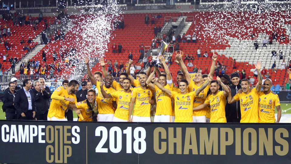 Tigres players celebrate their 3-1 win over Toronto FC in Wednesday’s inaugural Campeones Cup between the MLS and Mexican champs.