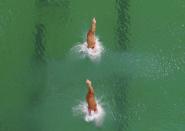 2016 Rio Olympics - Diving - Final - Women's Synchronised 10m Platform - Maria Lenk Aquatics Centre - Rio de Janeiro, Brazil - 09/08/2016. Roseline Filion (CAN) of Canada and Meaghan Benfeito (CAN) of Canada compete. REUTERS/Michael Dalder FOR EDITORIAL USE ONLY. NOT FOR SALE FOR MARKETING OR ADVERTISING CAMPAIGNS.