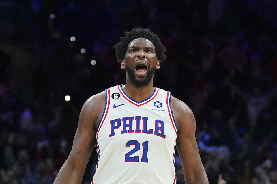 PHILADELPHIA, PA - JANUARY 28: Joel Embiid #21 of the Philadelphia 76ers reacts after making a basket against the Denver Nuggets in the fourth quarter of the game at the Wells Fargo Center on January 28, 2023 in Philadelphia, Pennsylvania. The 76ers defeated the Nuggets 126-119. NOTE TO USER: User expressly acknowledges and agrees that, by downloading and or using this photograph, User is consenting to the terms and conditions of the Getty Images License Agreement. (Photo by Mitchell Leff/Getty Images)