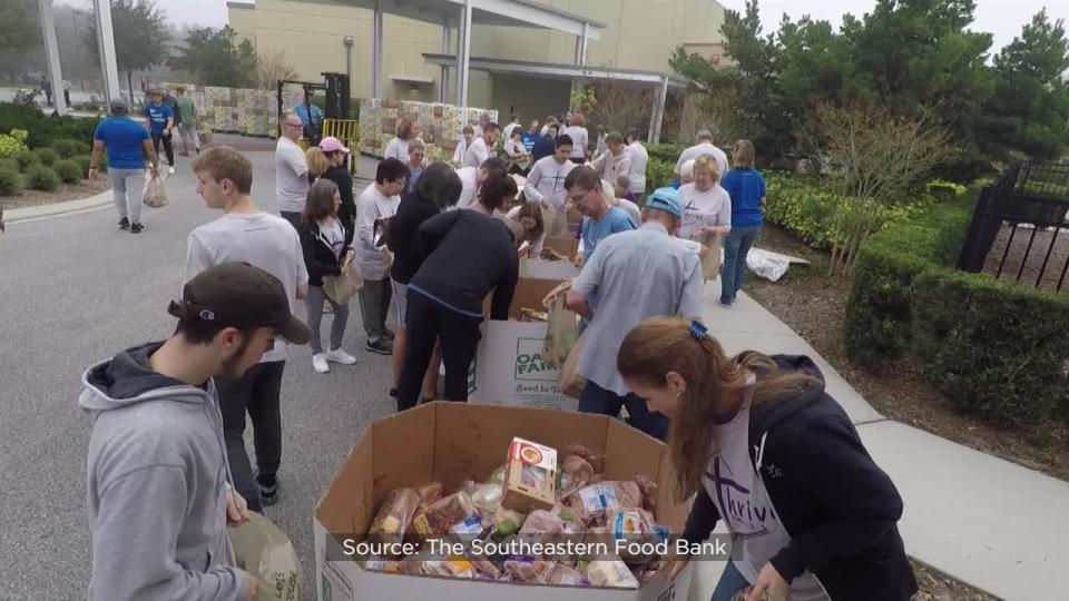 Hundreds of volunteers spent Thanksgiving morning giving back to families in need throughout West Orange County.