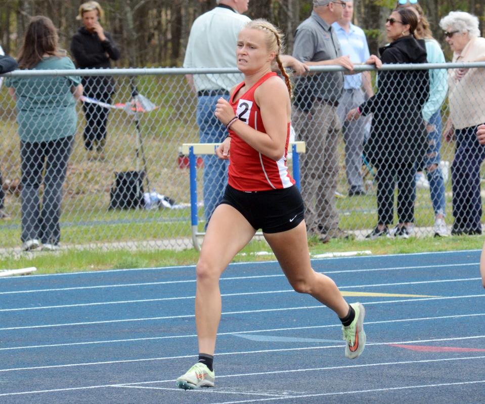 Allie Nowak runs in the 1600-meter run during the MHSAA Region 31-4 track meet on Friday, May 19 in Indian River, Mich.