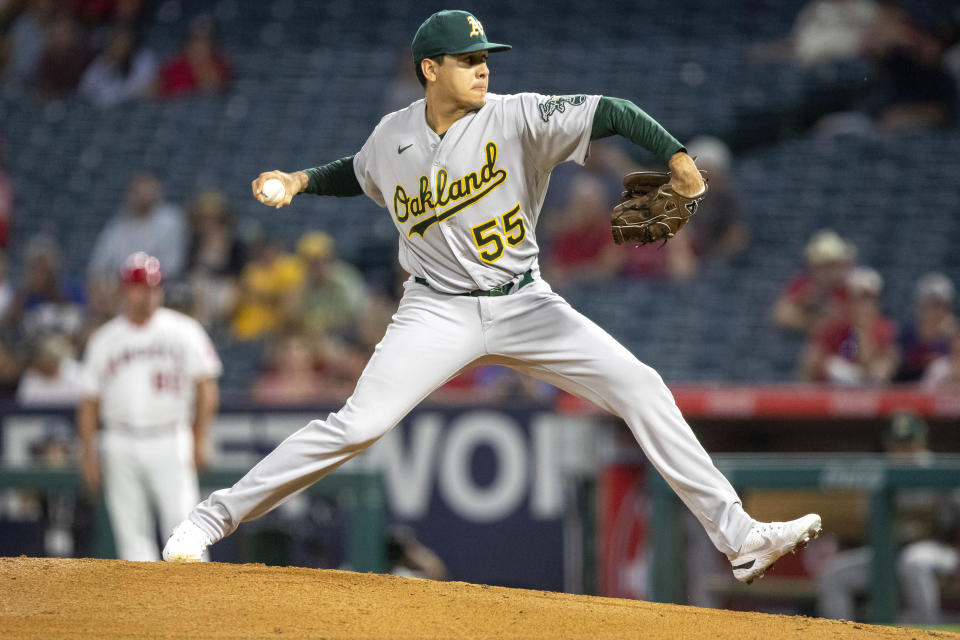 Oakland Athletics starting pitcher Adrian Martinez throws to a Los Angeles Angels batter during the first inning of a baseball game in Anaheim, Calif., Wednesday, Sept. 28, 2022. (AP Photo/Alex Gallardo)