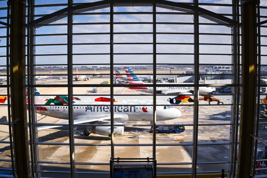 American Airlines airplanes sit on the tarmac of Reagan National airport in Arlington, Virginia, on Dec. 23, 2022.