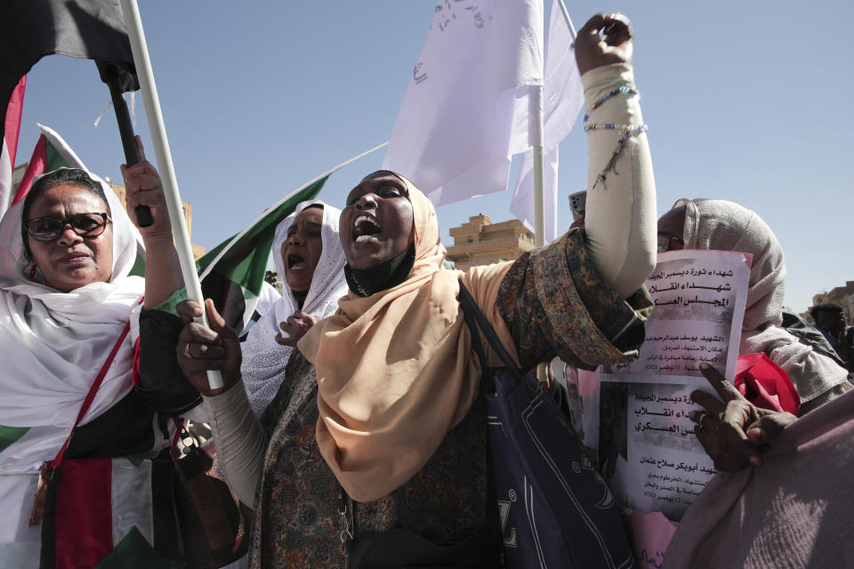 FILE - Sudanese demonstrators attend a rally to demand the return to civilian rule a year after a military coup, in Khartoum, Sudan, Nov. 17, 2022. Sudan’s ruling generals and the main pro-democracy group signed a framework deal until elections on Monday, Dec. 5, 2022, but key dissenters have stayed out of the agreement. The deal pledges to establish a new, civilian-led transitional government to guide the country to elections and offers a path forward in the wake of Sudan’s stalled transition to democracy following the October 2021 coup. (AP Photo/Marwan Ali, File)