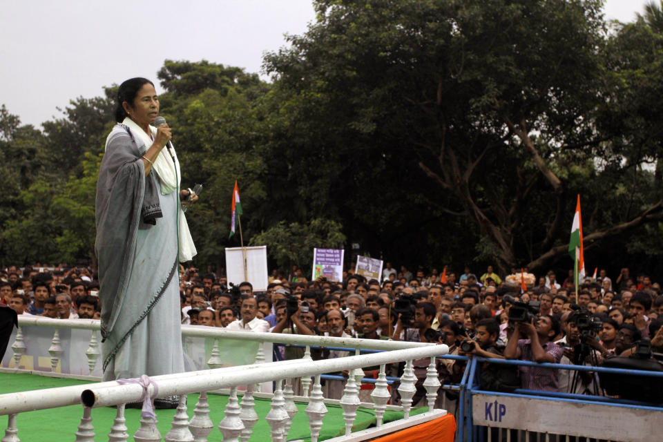 Chief Minister of West Bengal state Mamata Banerjee addresses a massive rally in Kolkata, India, Saturday, Sept. 15, 2012. Angry Indian opposition parties protested on Saturday against the government's decision to open the country's huge retail market to foreign retailers, a hike in the price of diesel fuel and reduction in cooking gas subsidies. (AP Photo/Bikas Das)