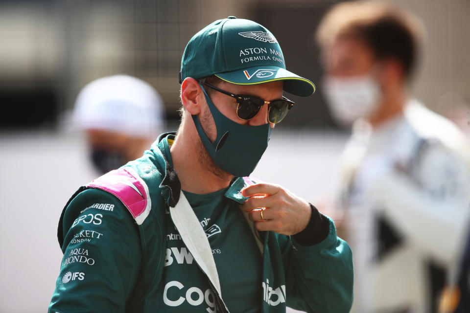 BAHRAIN, BAHRAIN - MARCH 12: Sebastian Vettel of Germany and Aston Martin F1 Team looks on from the grid during Day One of F1 Testing at Bahrain International Circuit on March 12, 2021 in Bahrain, Bahrain. (Photo by Joe Portlock/Getty Images)