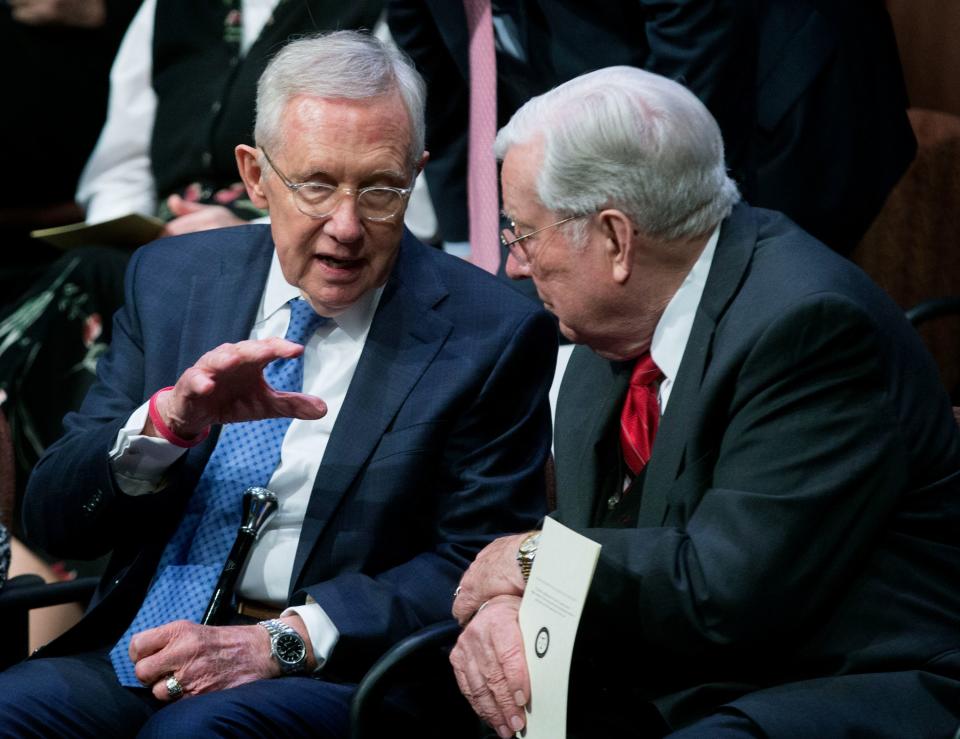 Then-Sen. Harry M. Reid speaks with Elder M. Russell Ballard at the J. Reuben Clark Law Society Annual Fireside at the Little Theater in the Conference Center in Salt Lake City.