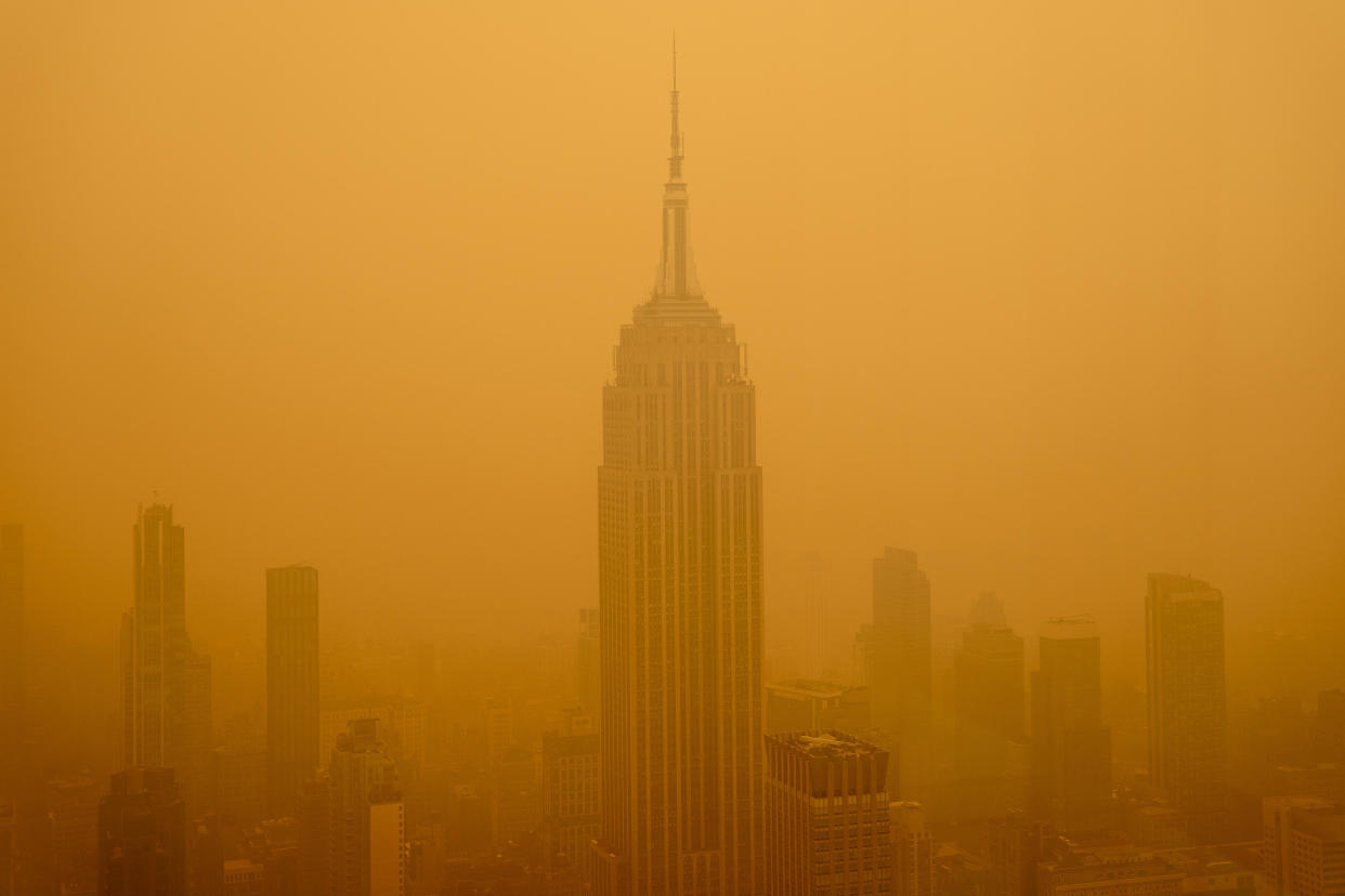 Smoky haze from wildfires in Canada diminished the visibility of the Empire State Building on June 7, 2023, in New York City.  / Credit: DAVID DEE DELGADO / Getty Images