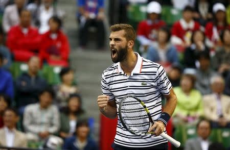 Benoit Paire of France reacts after winning a point against Japan's Kei Nishikori during their men's singles semifinal match at the Japan Open tennis championships in Tokyo October 10, 2015. REUTERS/Thomas Peter