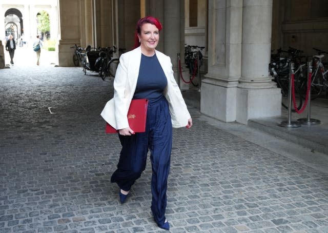 Secretary of State for Transport Louise Haigh walking with a red Government folder under her arm