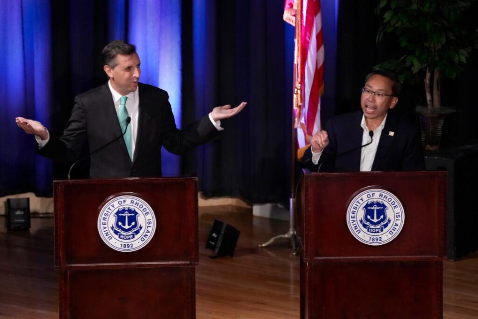 Democratic candidate Seth Magaziner, Republican candidate Allan Fung disagreeing on an abortion rights question. Democratic candidate Seth Magaziner, Republican candidate Allan Fung and Moderate candidate Bill Gilbert at the Second Congressional District Forum at URI sponsored by The Providence Journal, the University of RI, and The Public's Radio on Oct 17, 2022.