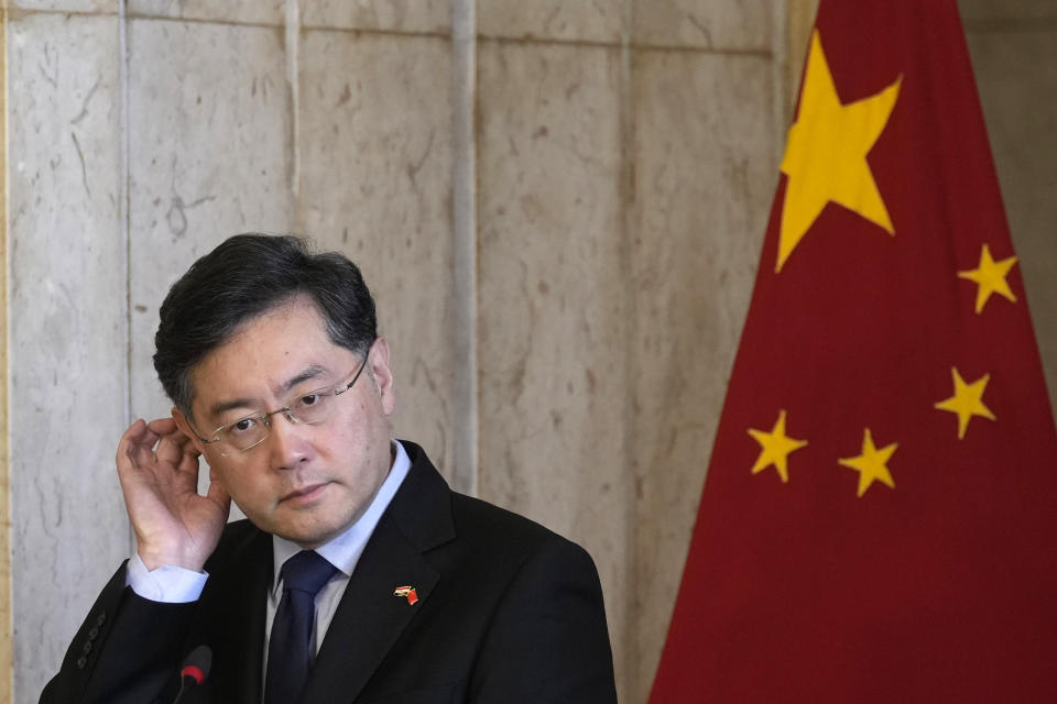 FILE - Chinese Foreign Minister Qin Gang, listens during a press conference with his Egyptian counterpart Sameh Shoukry, at the foreign ministry headquarters in Cairo, Egypt, on Jan. 15, 2023. China has removed outspoken foreign minister Qin Gang from office and replaced him with his predecessor, Wang Yi. In an announcement on Tuesday, July 25, 2023, state media gave no reason for Qin’s removal, but it comes after he dropped out of sight almost one month ago amid speculation over his personal affairs and political rivalries.(AP Photo/Amr Nabil, File)