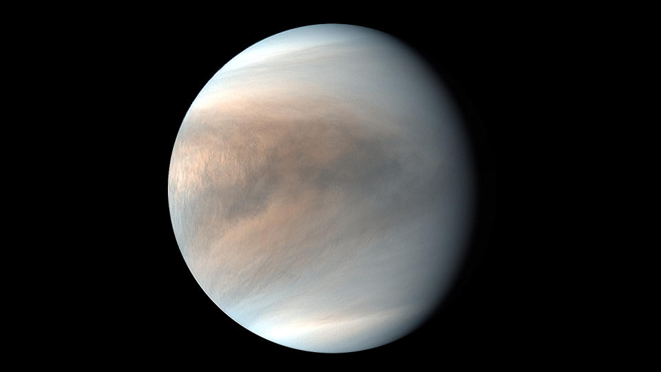 cloudy venus against the blackness of space