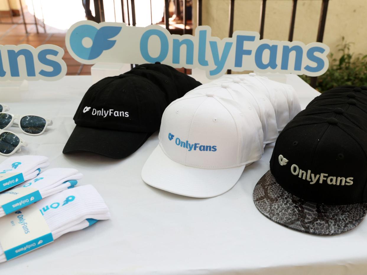 Photo of hats with OnlyFans logo