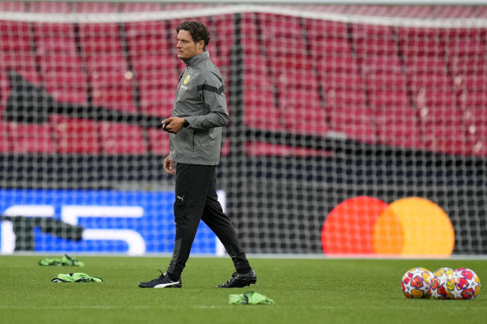 Dortmund's head coach Edin Terzic watches his team during a training session ahead of the Champions League final soccer match between Borussia Dortmund and Real Madrid at Wembley Stadium in London , Friday, May 31, 2024.(AP Photo/Kirsty Wigglesworth)