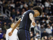 Butler guard Chuck Harris (3) reacts after being called for a foul during the second half of an NCAA college basketball game against Providence, Sunday, Jan. 23, 2022, in Providence, R.I. (AP Photo/Mary Schwalm)