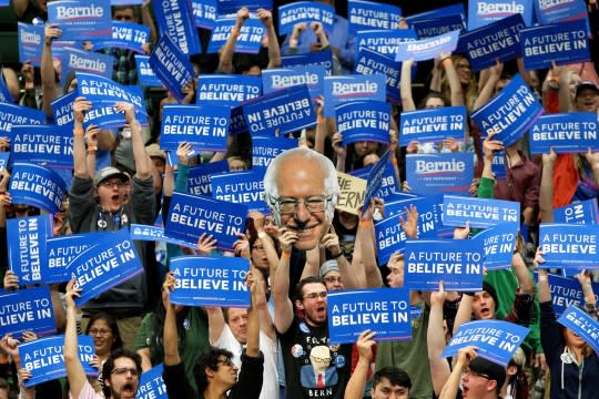 Students and supporters of Sen. Bernie Sanders hold signs during a campaign rally at Colorado State University in Fort Collins, Colo. (Photo: Jacquelyn Martin/AP)
