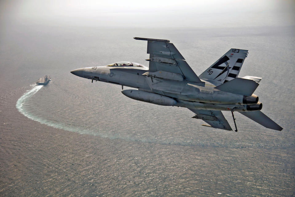 A U.S. Navy F/A-18F Super Hornet jet piloted by LCDR Jamie R. Struck approaches the USS Gerald R. Ford to make the first landing using the AAG arrested landing system in the Atlantic Ocean July 28, 2017. (U.S. Navy/Erik Hildebrandt/Handout)