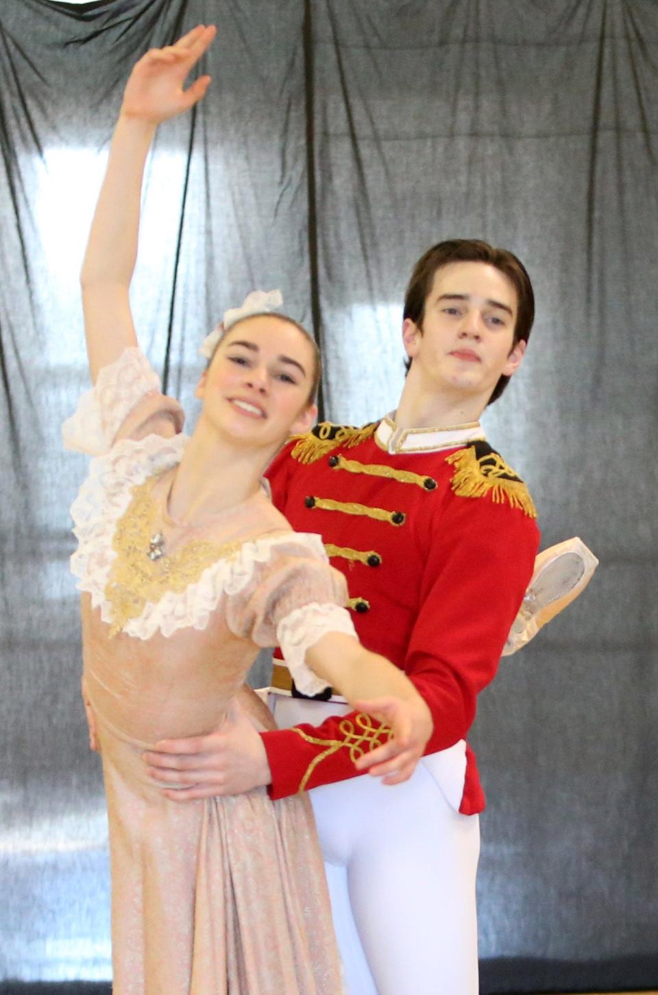 Caitlyn Gongwer, 15, an understudy for the part of Marie, and Fred Stuckwisch, 17, as the Nutcracker, rehearse the snow scene in the Southold Dance Company's production of "The Nutcracker" on Nov. 21, 2022, at the Colfax Cultural Center in South Bend.